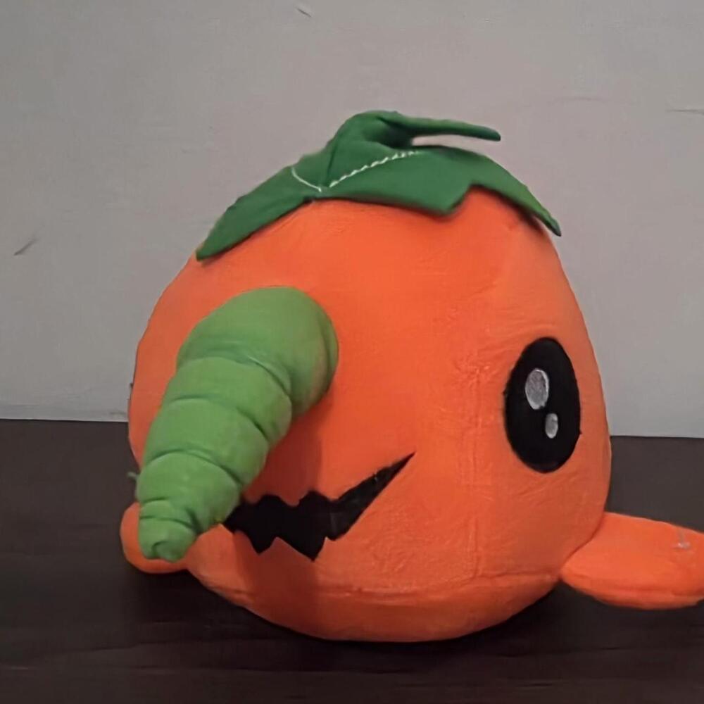 Orange pumpkin narwhal plushie with green stem and leaf #halloween #pumpkin